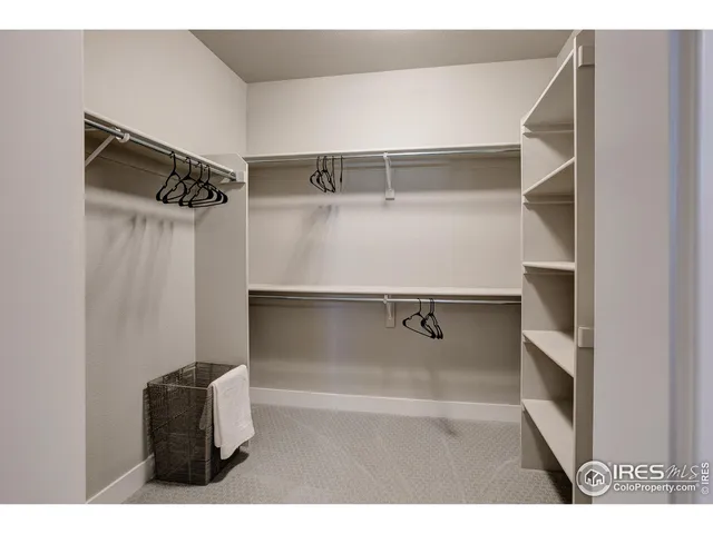 a bathroom with a sink a mirror and a shower