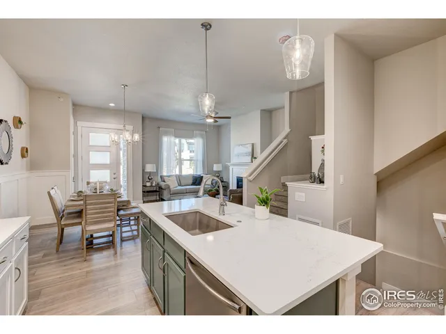 a kitchen with a table and chairs