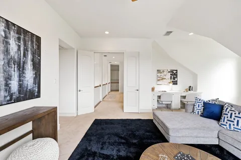 a living room with furniture and a couch