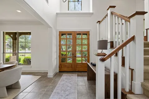 a view of entryway with a front door