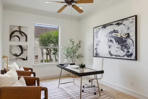 a view of a livingroom with furniture and window