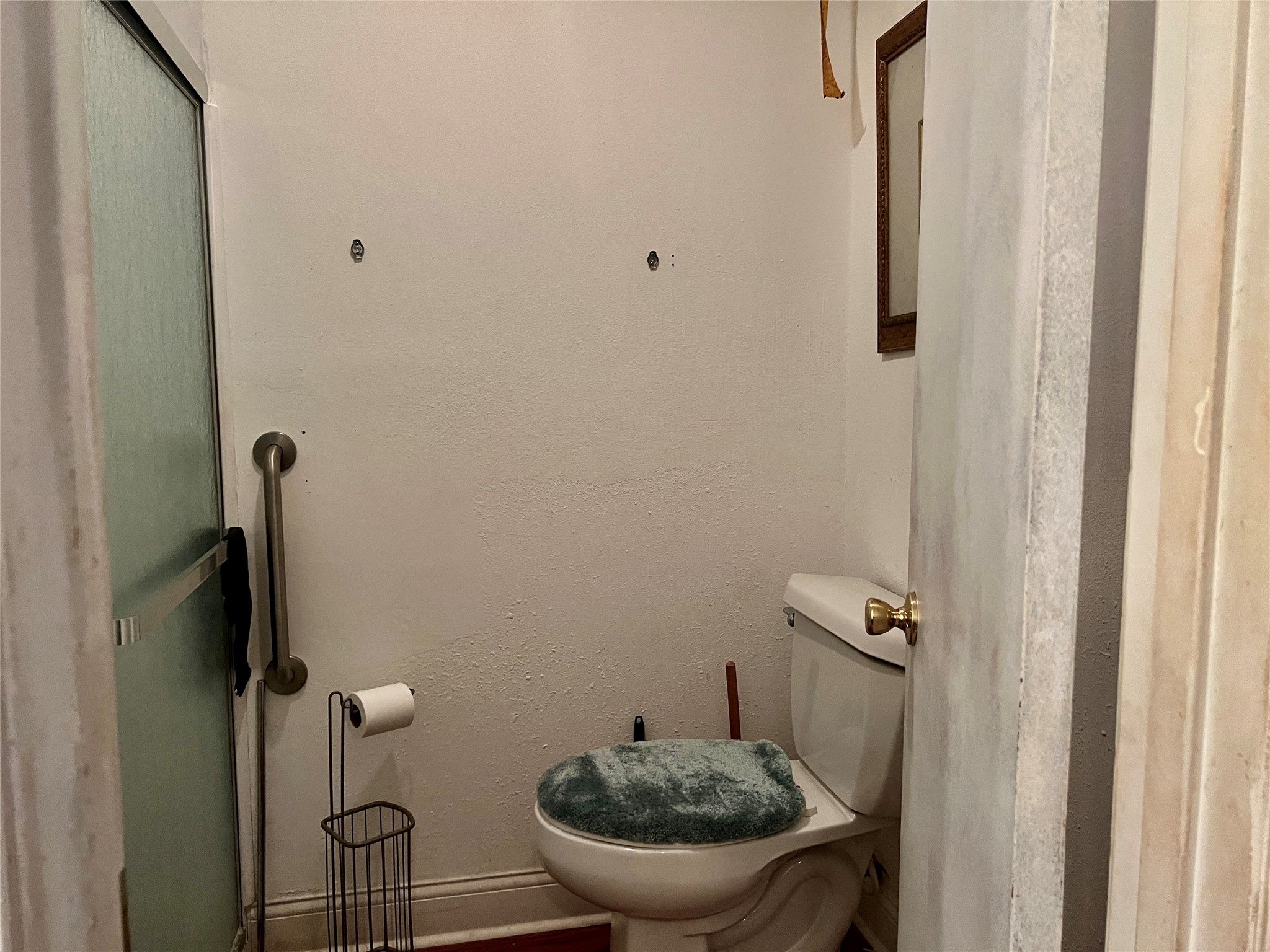 500 West 15th Street Port Arthur, TX 77640 - Photo 15 of 17 a bathroom with a toilet and a sink