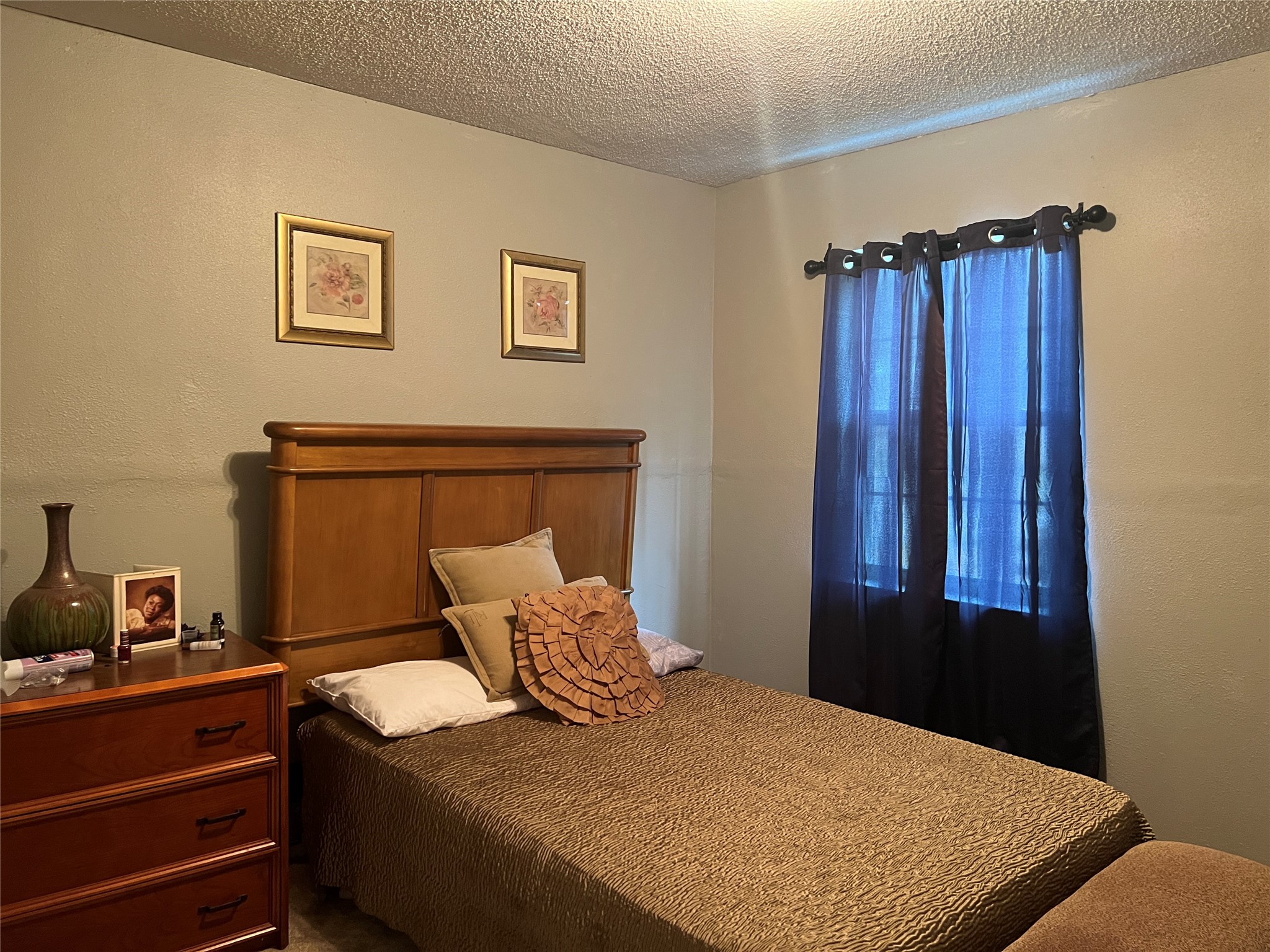 500 West 15th Street Port Arthur, TX 77640 - Photo 16 of 17 a bedroom with a bed and a window