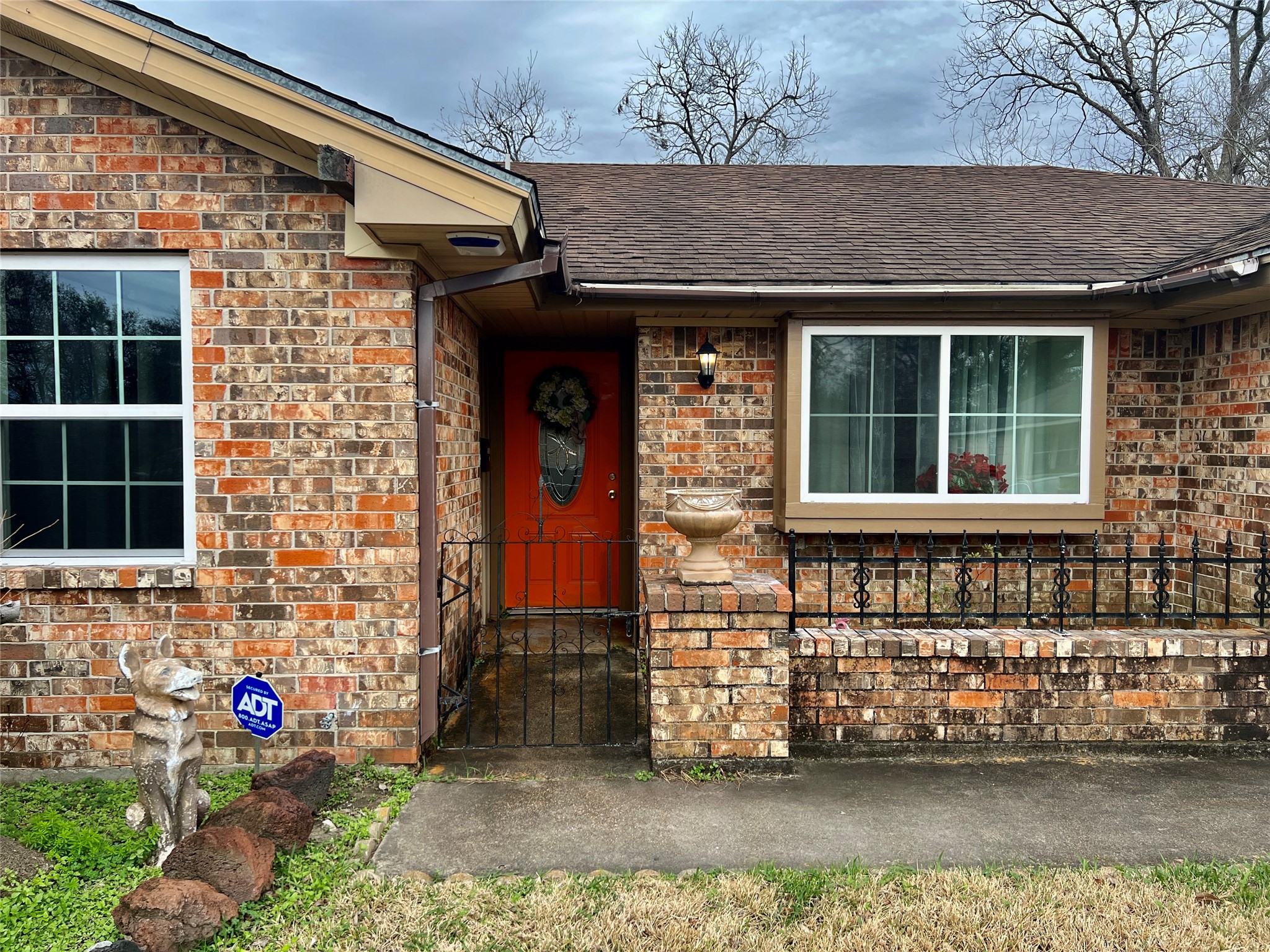 500 West 15th Street Port Arthur, TX 77640 - Photo 2 of 17 a front view of a house with a garden