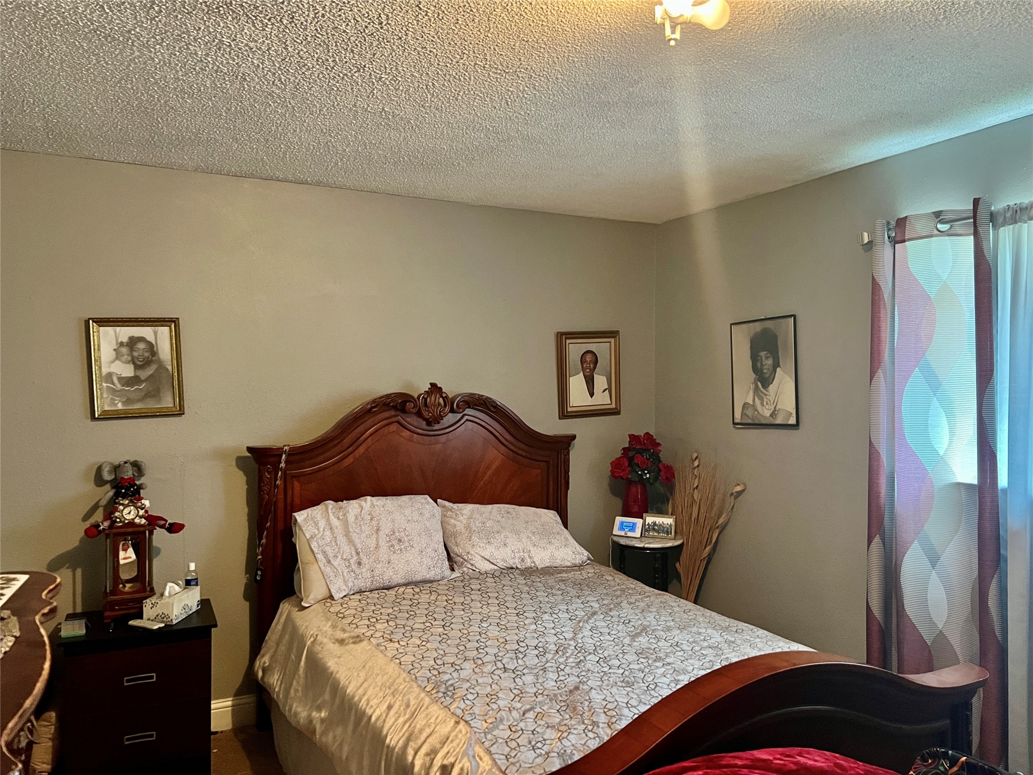 500 West 15th Street Port Arthur, TX 77640 - Photo 10 of 17 a bedroom with a bed and a dresser