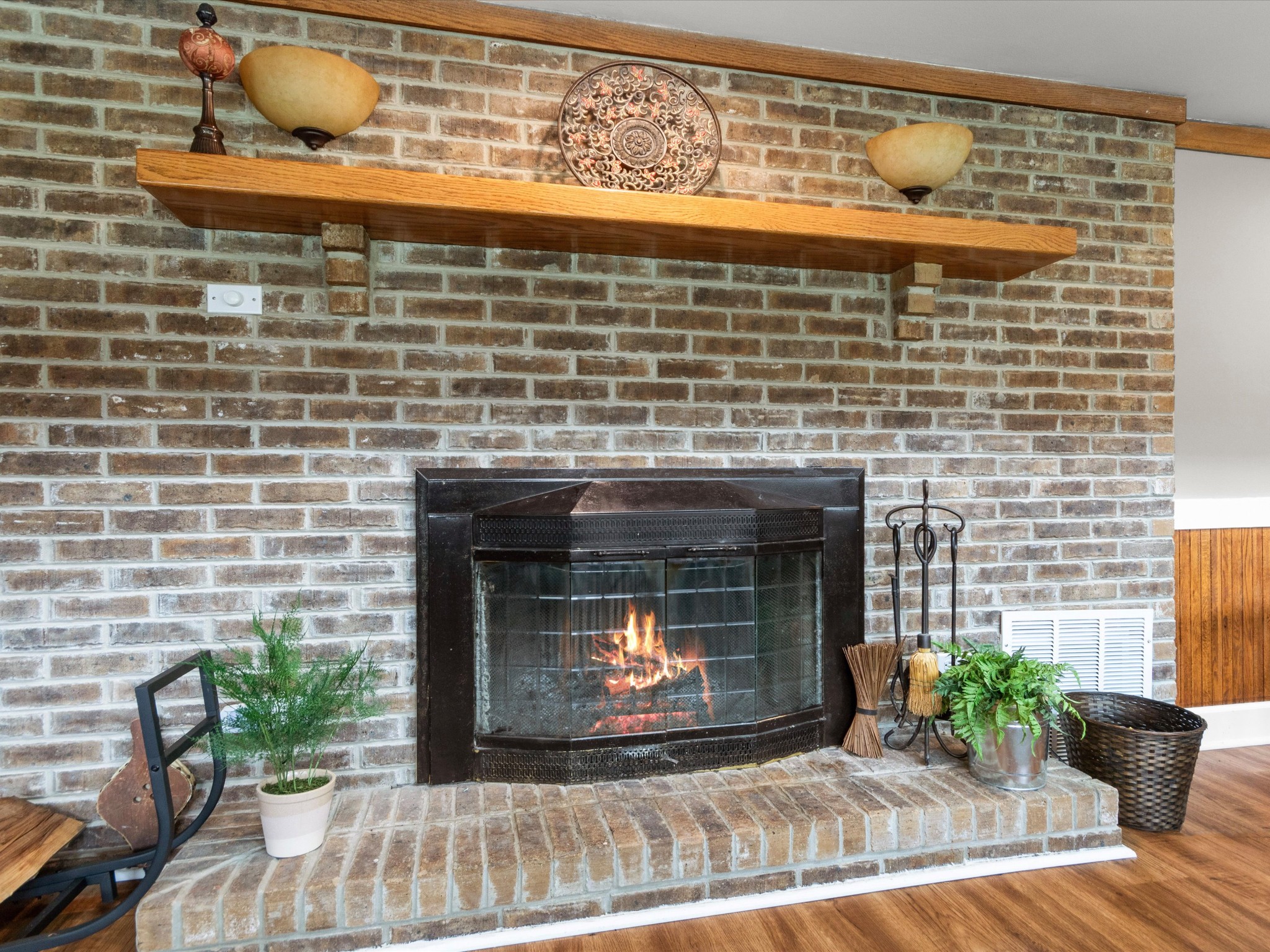 96 Maple Drive Winchester, TN 37398 - Photo 12 of 40 a fireplace with a vase of flowers