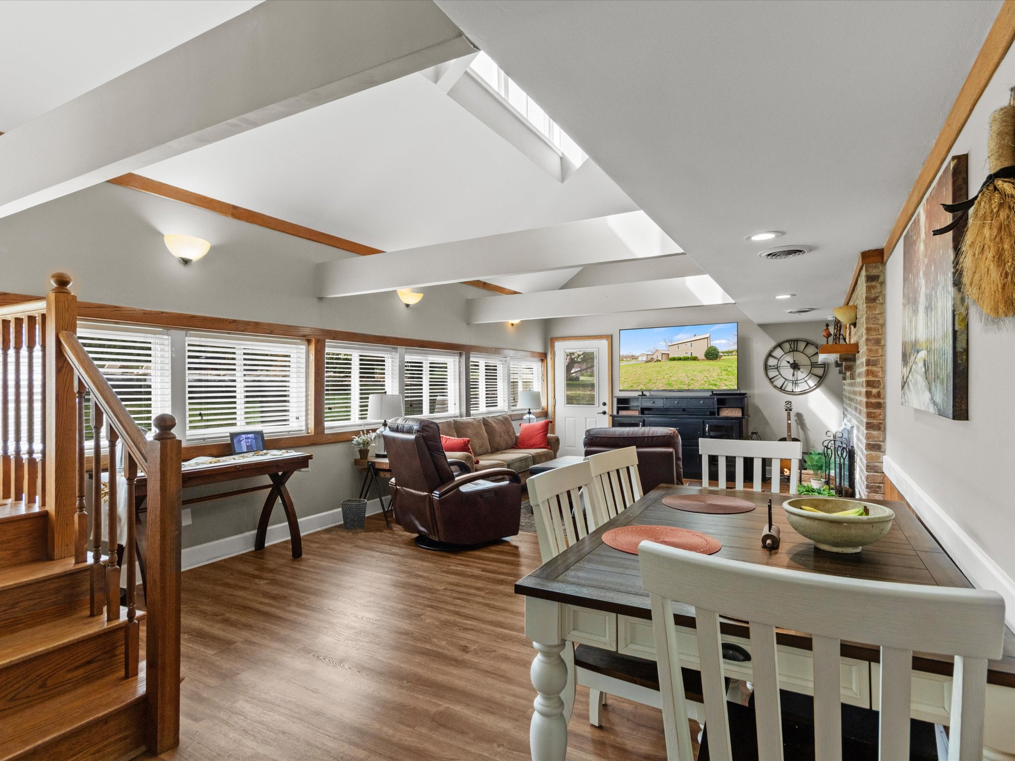96 Maple Drive Winchester, TN 37398 - Photo 13 of 40 a view of a dining room with furniture window and wooden floor