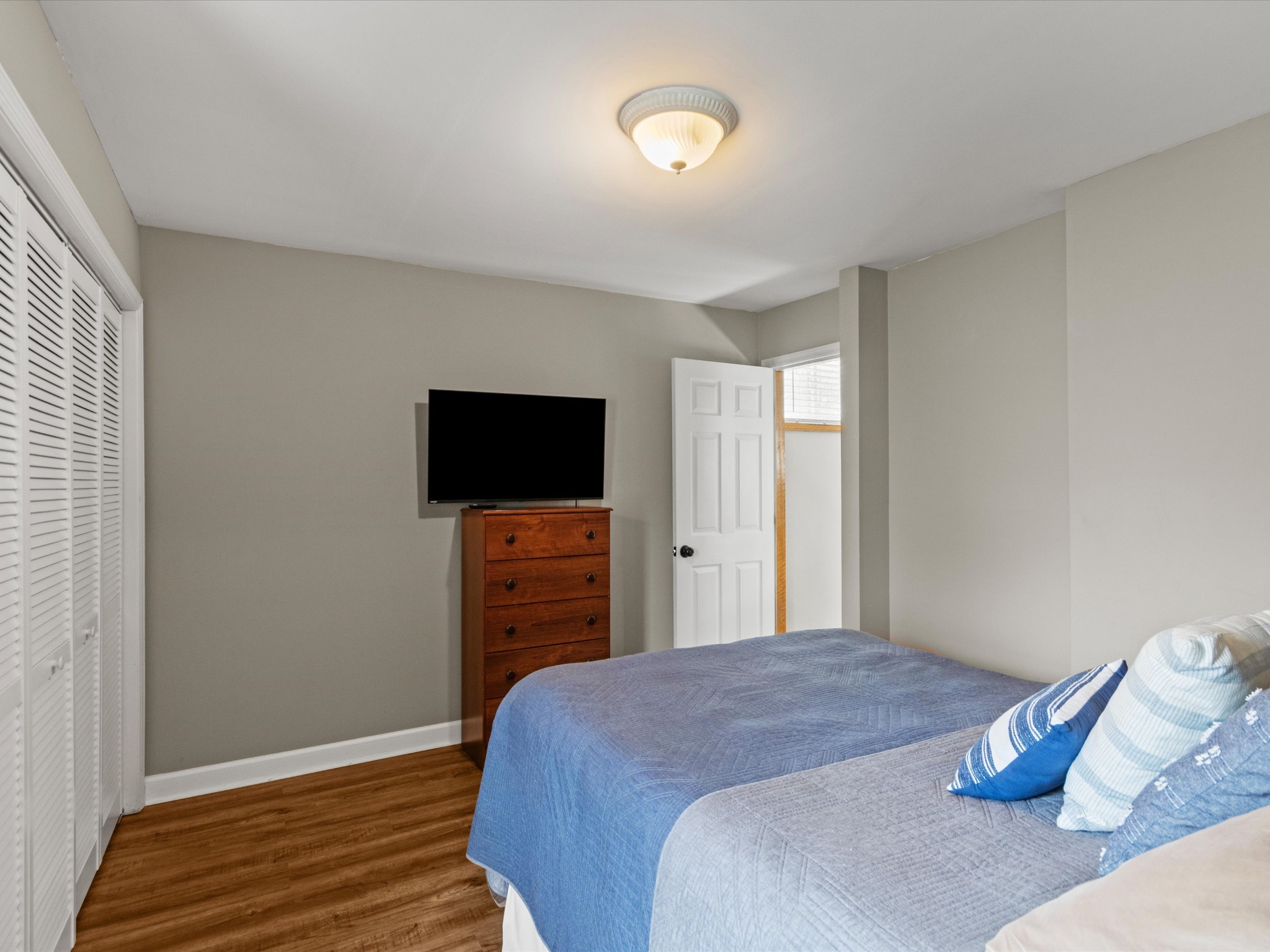 96 Maple Drive Winchester, TN 37398 - Photo 24 of 40 a bedroom with a bed and a flat screen tv