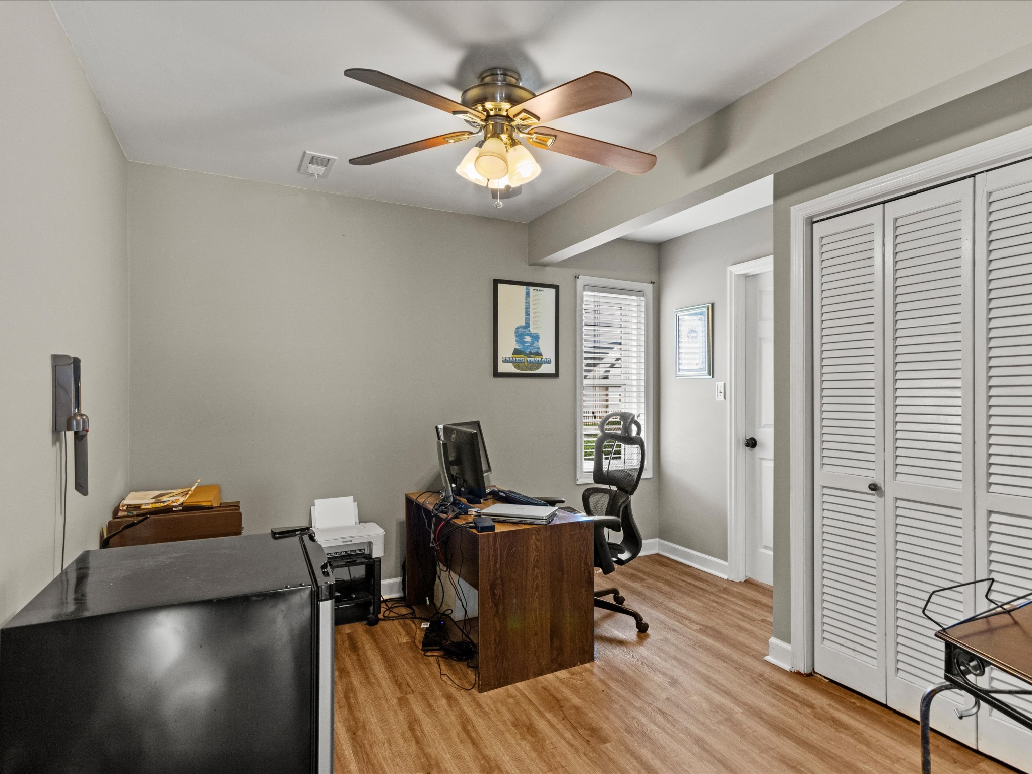 96 Maple Drive Winchester, TN 37398 - Photo 25 of 40 a view of a workspace with furniture and wooden floor