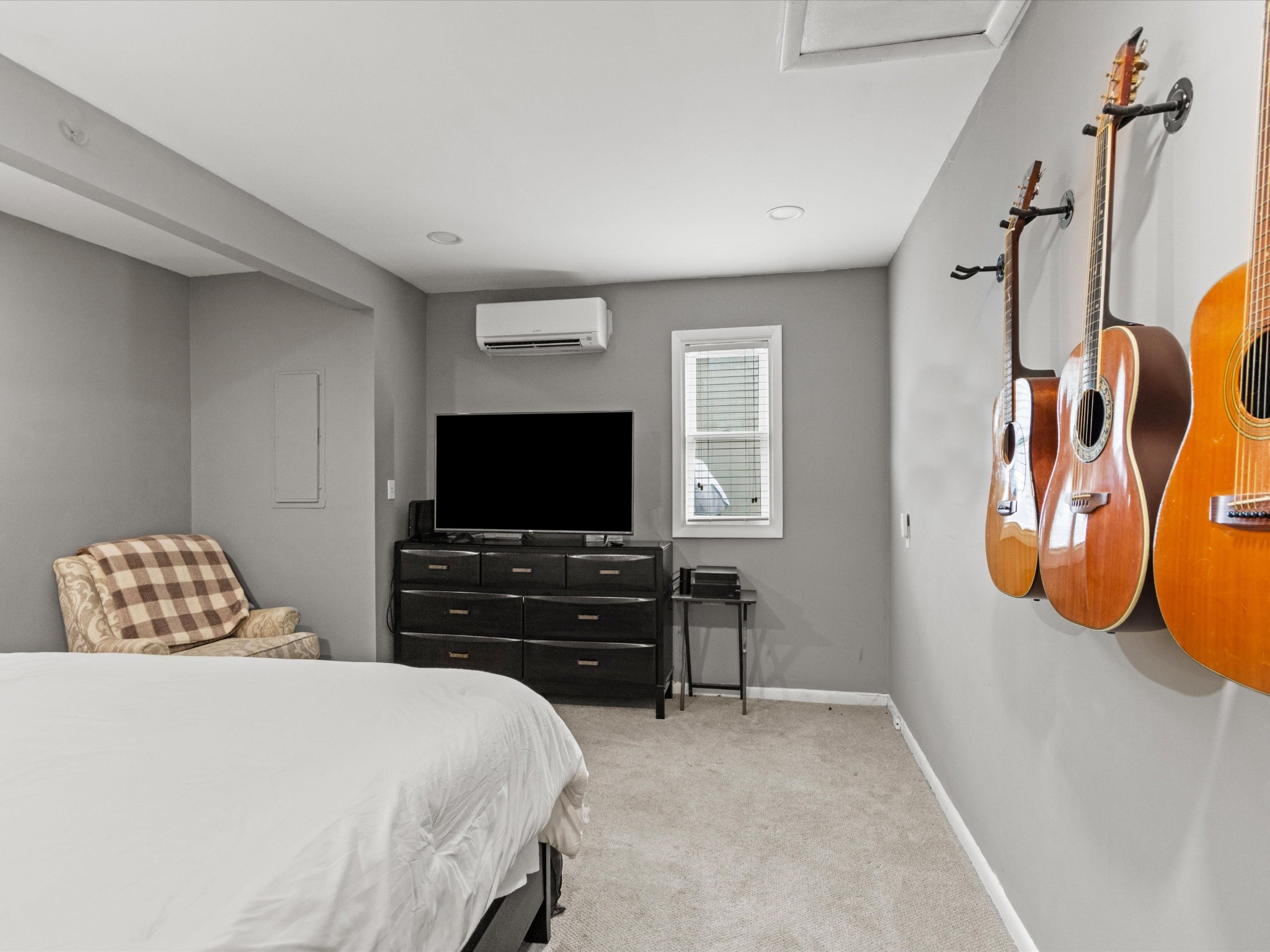 96 Maple Drive Winchester, TN 37398 - Photo 26 of 40 a bedroom with a bed and a flat screen tv