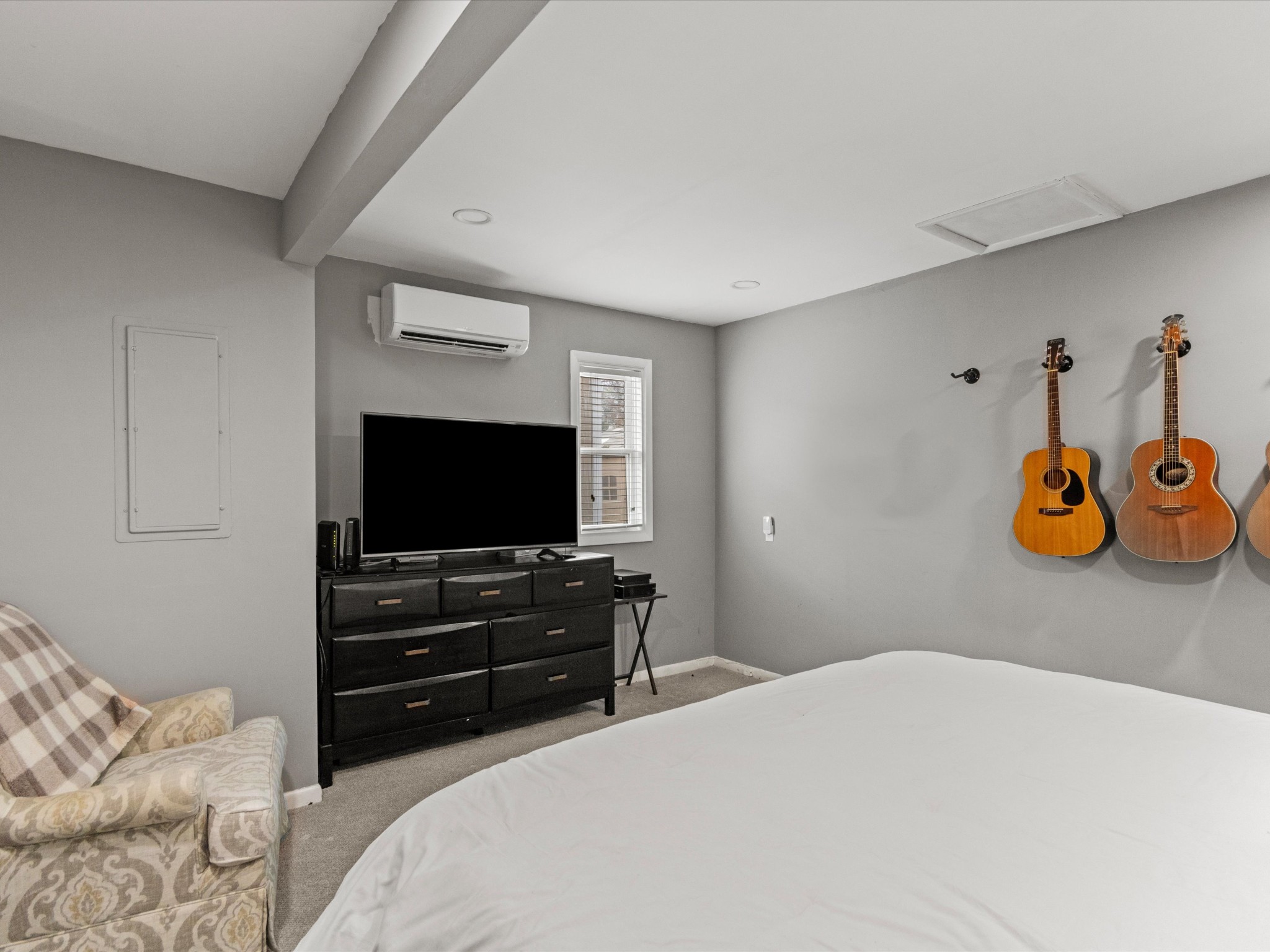 96 Maple Drive Winchester, TN 37398 - Photo 27 of 40 a bedroom with a bed and a flat screen tv