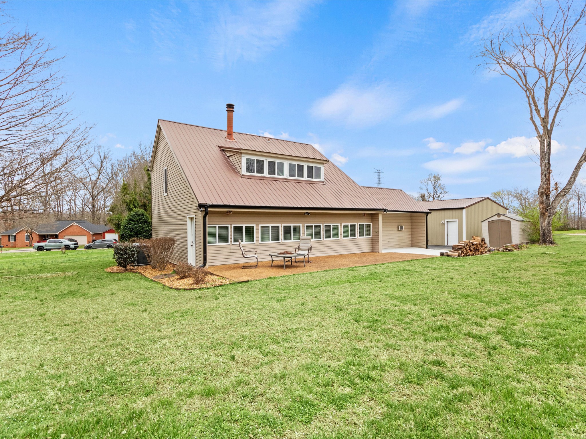 96 Maple Drive Winchester, TN 37398 - Photo 6 of 40 a view of a house with a yard table and chairs