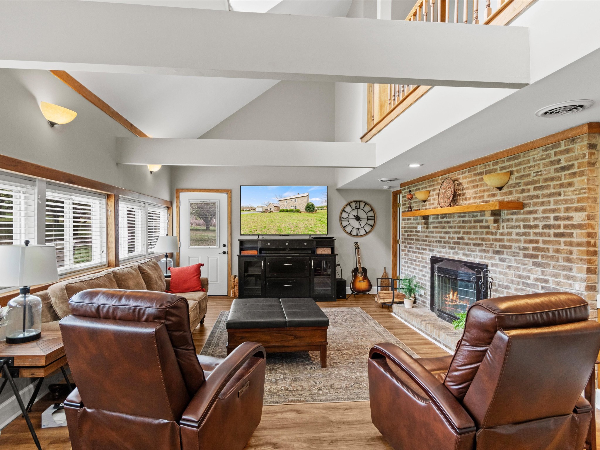 96 Maple Drive Winchester, TN 37398 - Photo 9 of 40 a living room with furniture flat screen tv and a fireplace