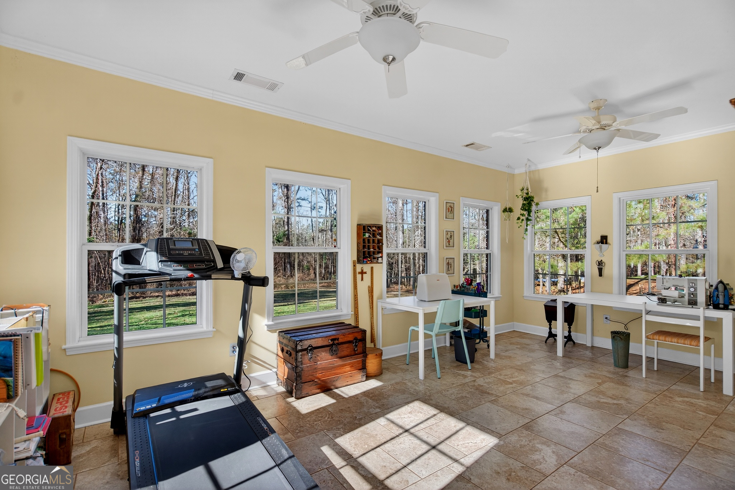 830 John Lovelace Road LaGrange, GA 30241 - Photo 30 of 44 a room with lots of furniture and windows