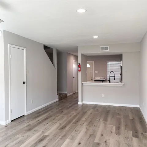 a view of a living room with a sink