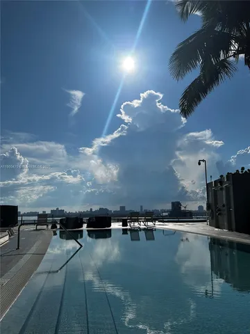 a view of an ocean with city