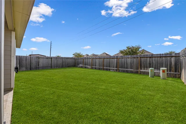 a view of a backyard with a garden