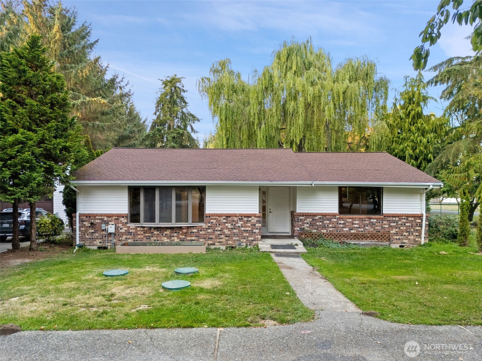 110 Marchbanks Road Sequim, WA 98382 - Photo 1 of 35 a front view of house with yard and green space