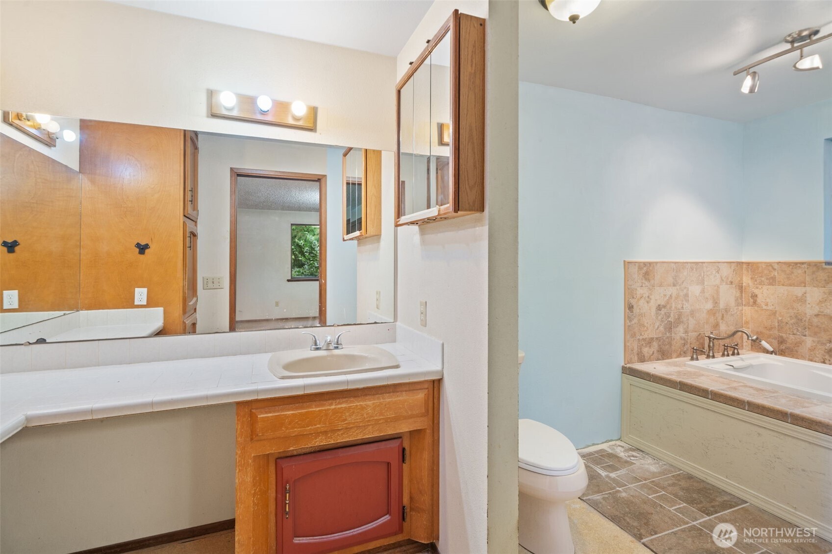 110 Marchbanks Road Sequim, WA 98382 - Photo 13 of 35 a bathroom with a granite countertop sink toilet and shower