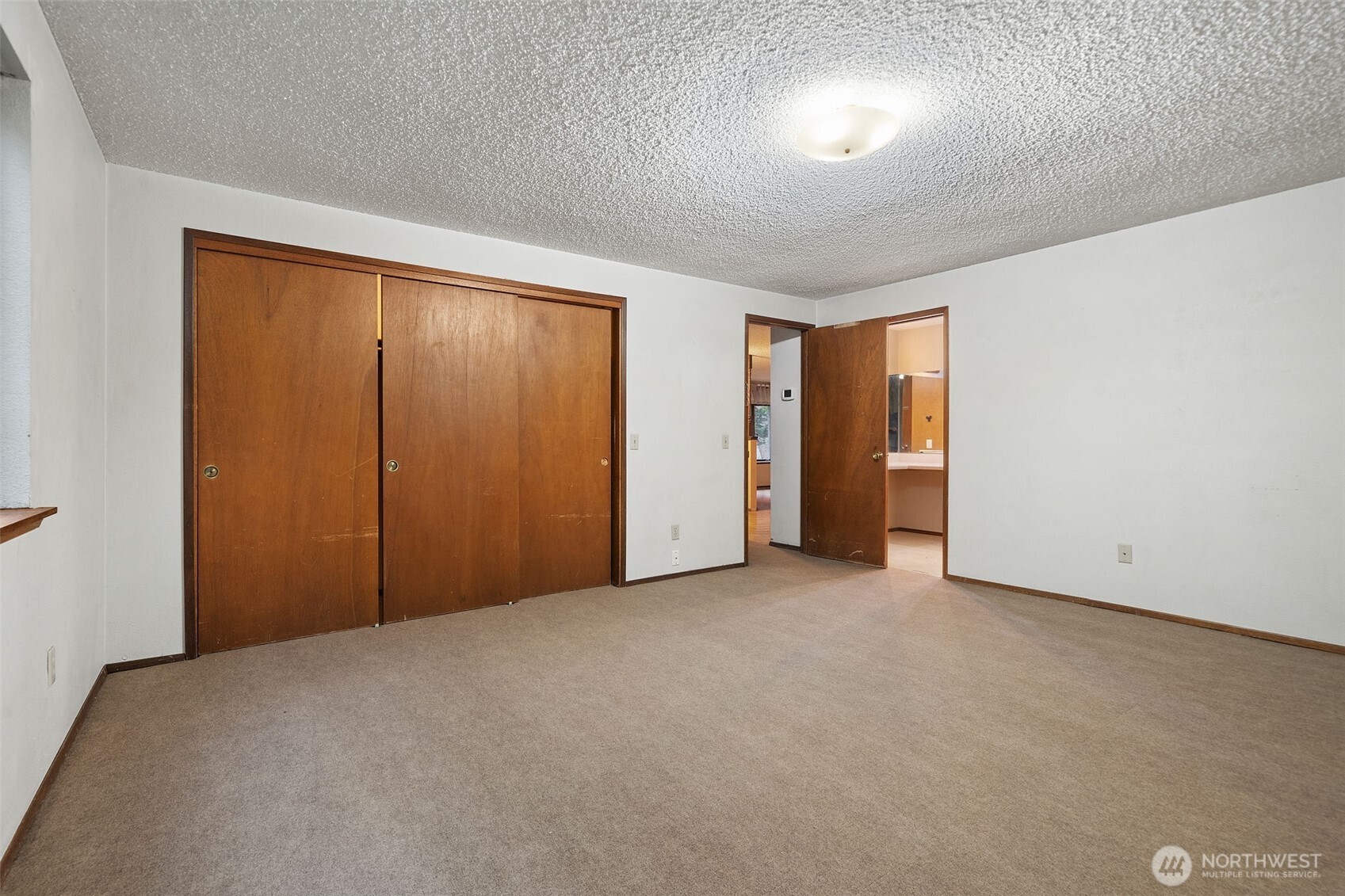 110 Marchbanks Road Sequim, WA 98382 - Photo 18 of 35 an empty room with closet area