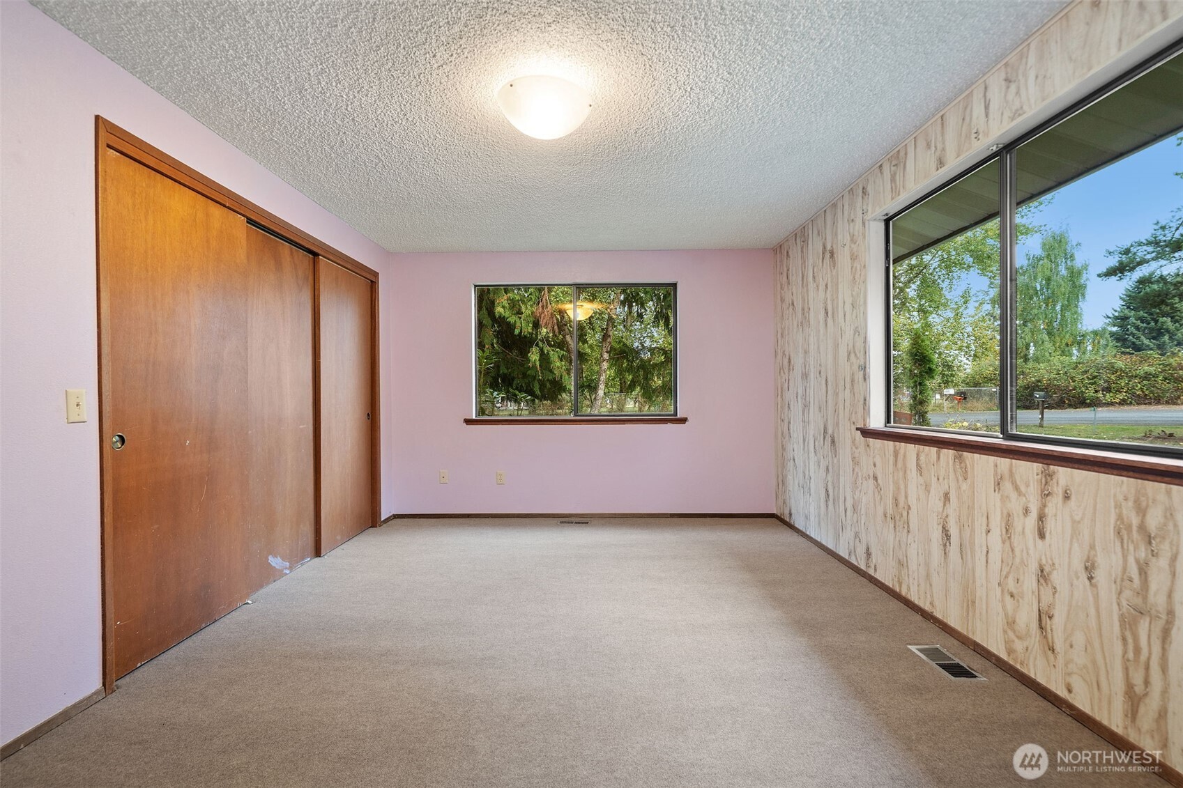 110 Marchbanks Road Sequim, WA 98382 - Photo 19 of 35 an empty room with windows and entrance