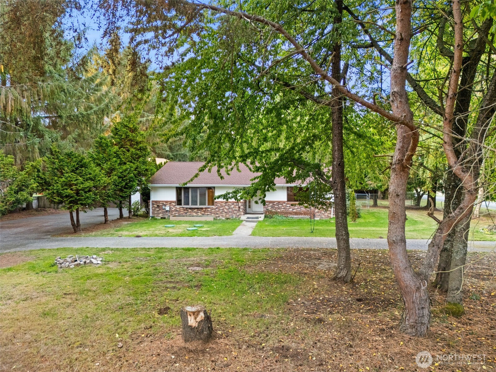 110 Marchbanks Road Sequim, WA 98382 - Photo 4 of 35 a view of a house with a yard and a tree