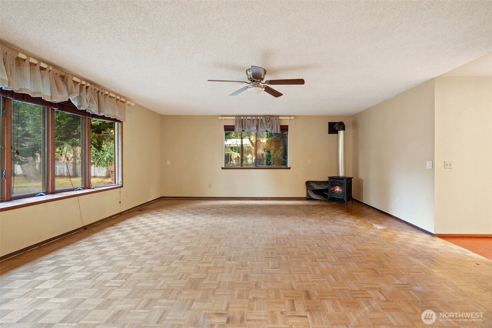 110 Marchbanks Road Sequim, WA 98382 - Photo 7 of 35 a view of an empty room with a window