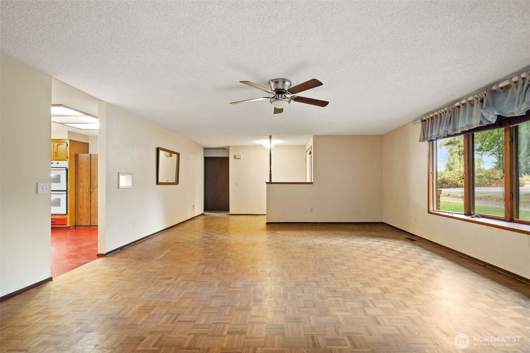 110 Marchbanks Road Sequim, WA 98382 - Photo 8 of 35 a view of an empty room with a window