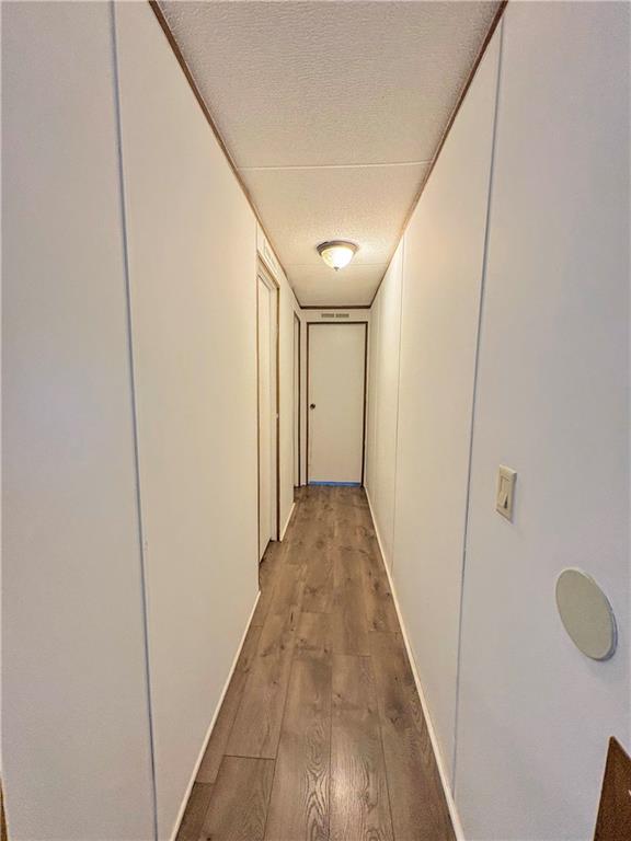 1560 Grindle Bridge Road Dahlonega, GA 30533 - Photo 14 of 21 a view of a hallway with wooden floor