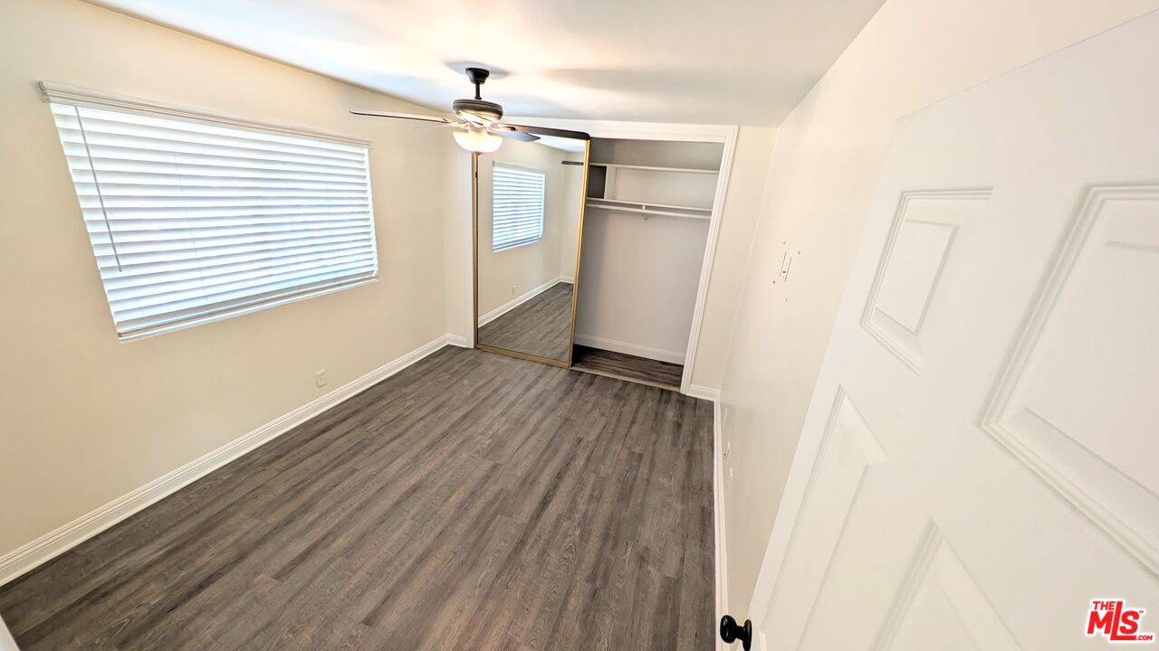 11246 Culver Boulevard Culver City, CA 90230 - Photo 8 of 13 a view of a room with wooden floor and a window