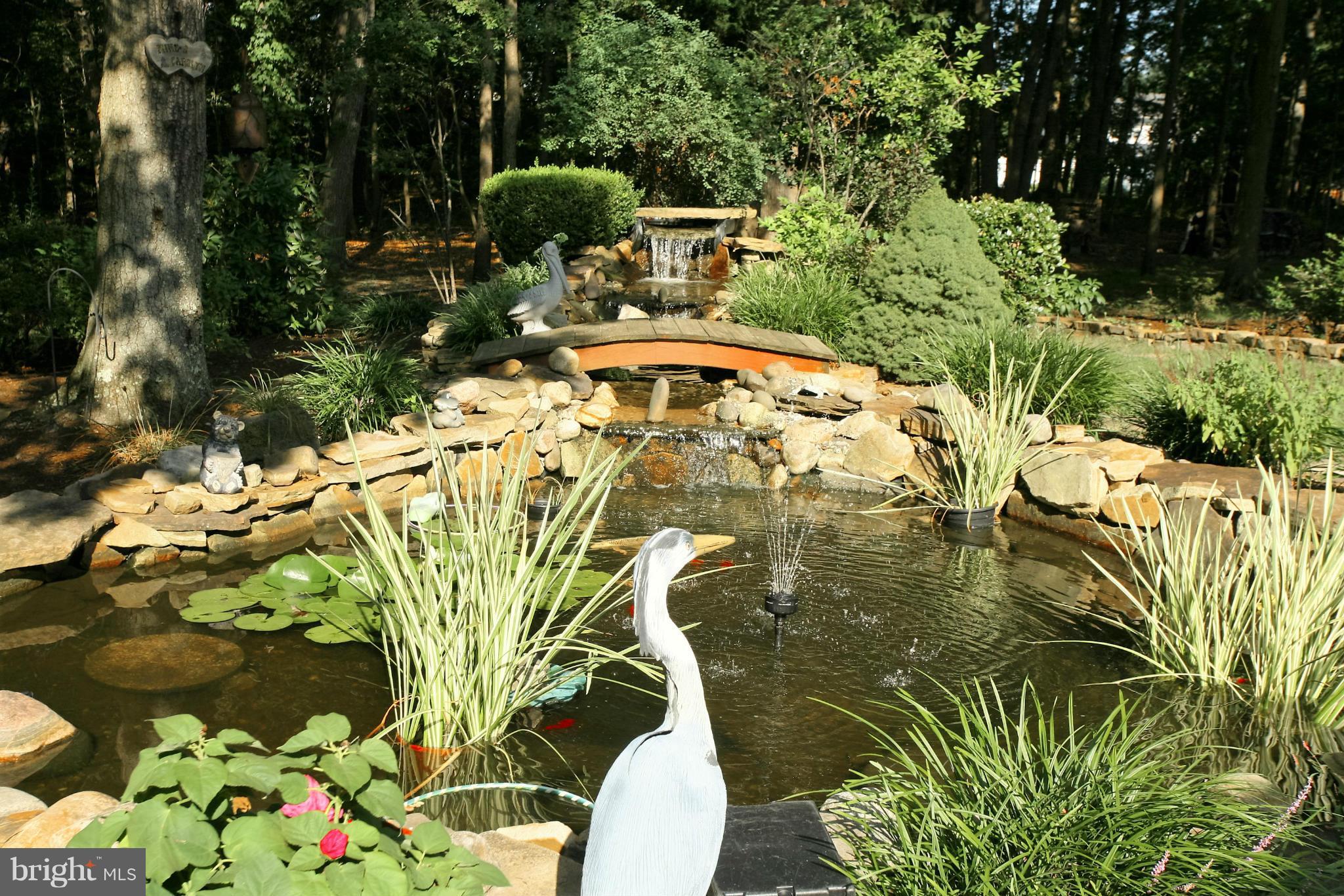 562 Pasture Brook Road Severn, MD 21144 - Photo 27 of 29 Koi Pond with water Features.