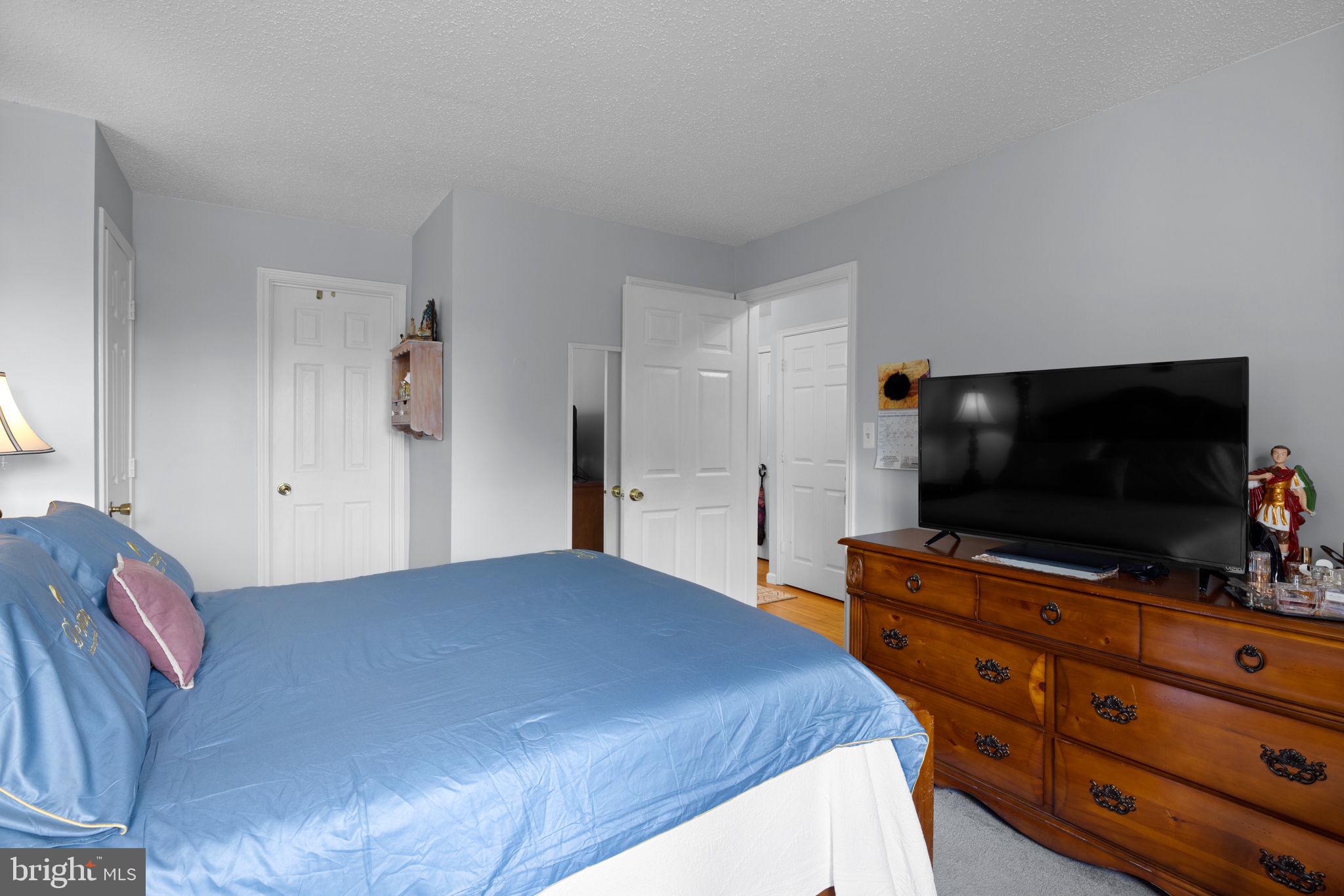 20957 Timber Ridge Terrace, Unit 301 Ashburn, VA 20147 - Photo 13 of 19 Primary Bedroom