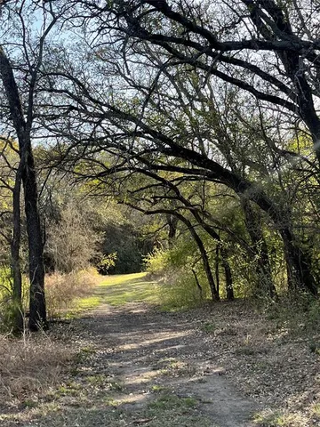 a view of yard covered with snow in outdoor space