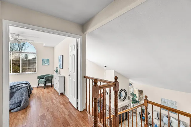 a view of front door and porch with wooden floor