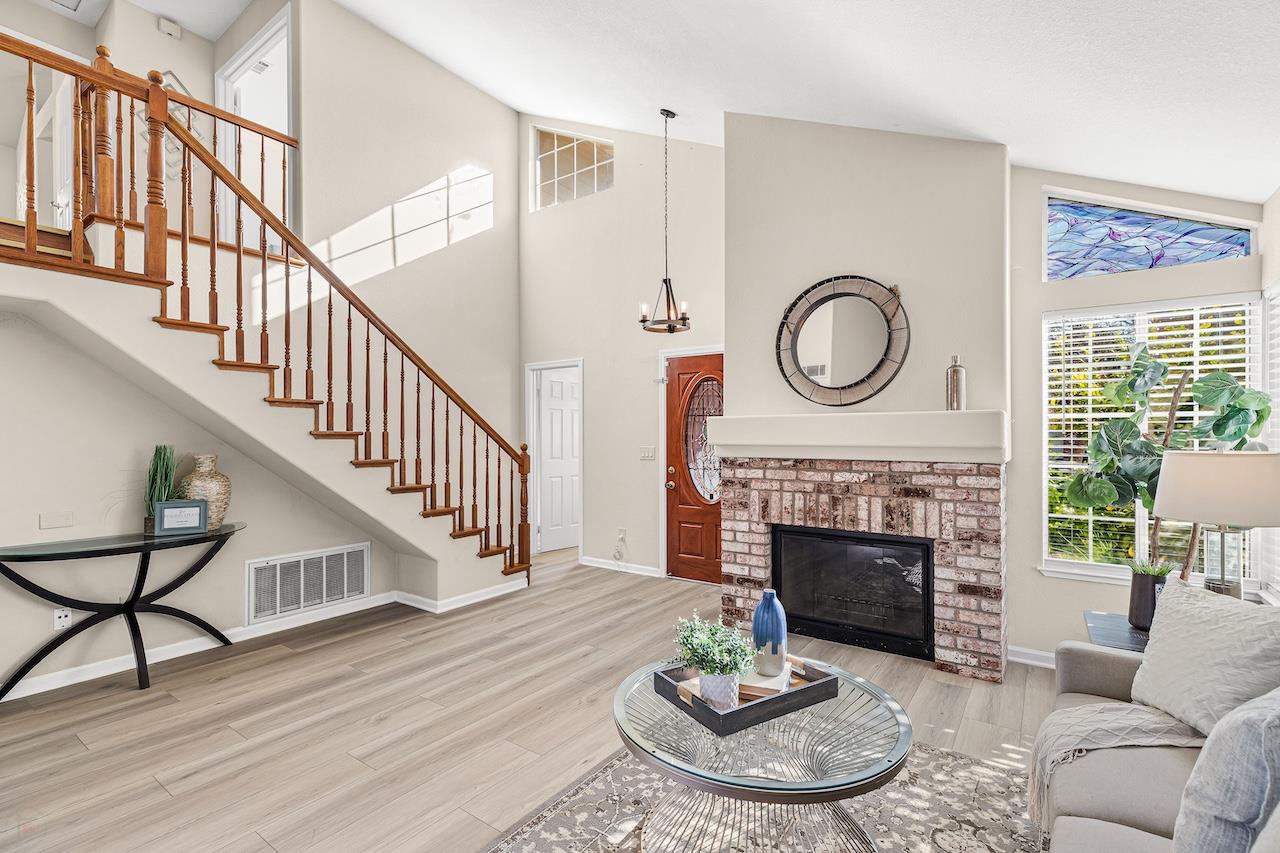 839 Williams Street Tracy, CA 95376 - Photo 10 of 42 a living room with furniture and a fireplace
