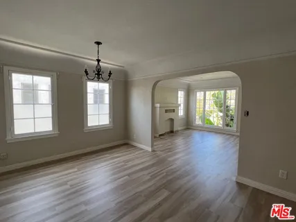a kitchen with a sink stove and microwave