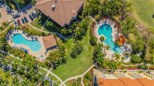 an aerial view of a house with a garden