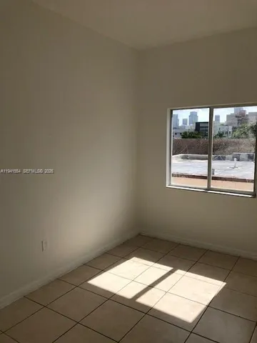 an empty room with a window