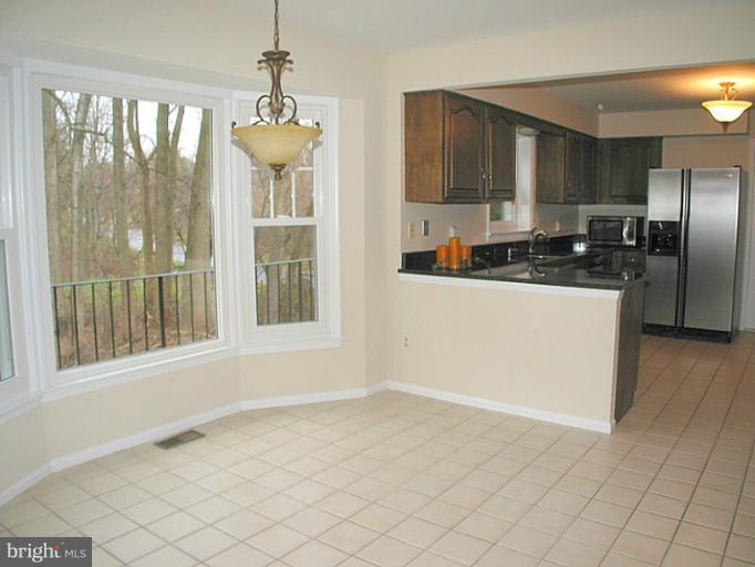 9401 Reach Road Potomac, MD 20854 - Photo 8 of 30 Breakfast Area with Kitchen View