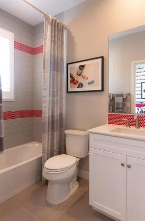a potted plant sitting in front of a house