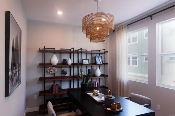 a bedroom with a bed and a mirror