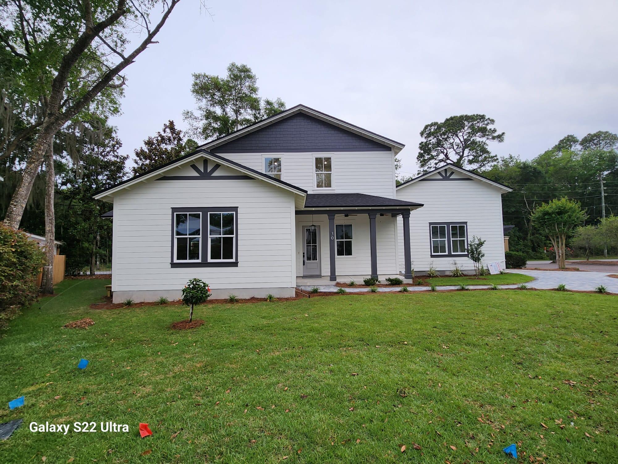 30 Beacon Point Drive Santa Rosa Beach, FL 32459 - Photo 1 of 53 a front view of a house with a garden and yard