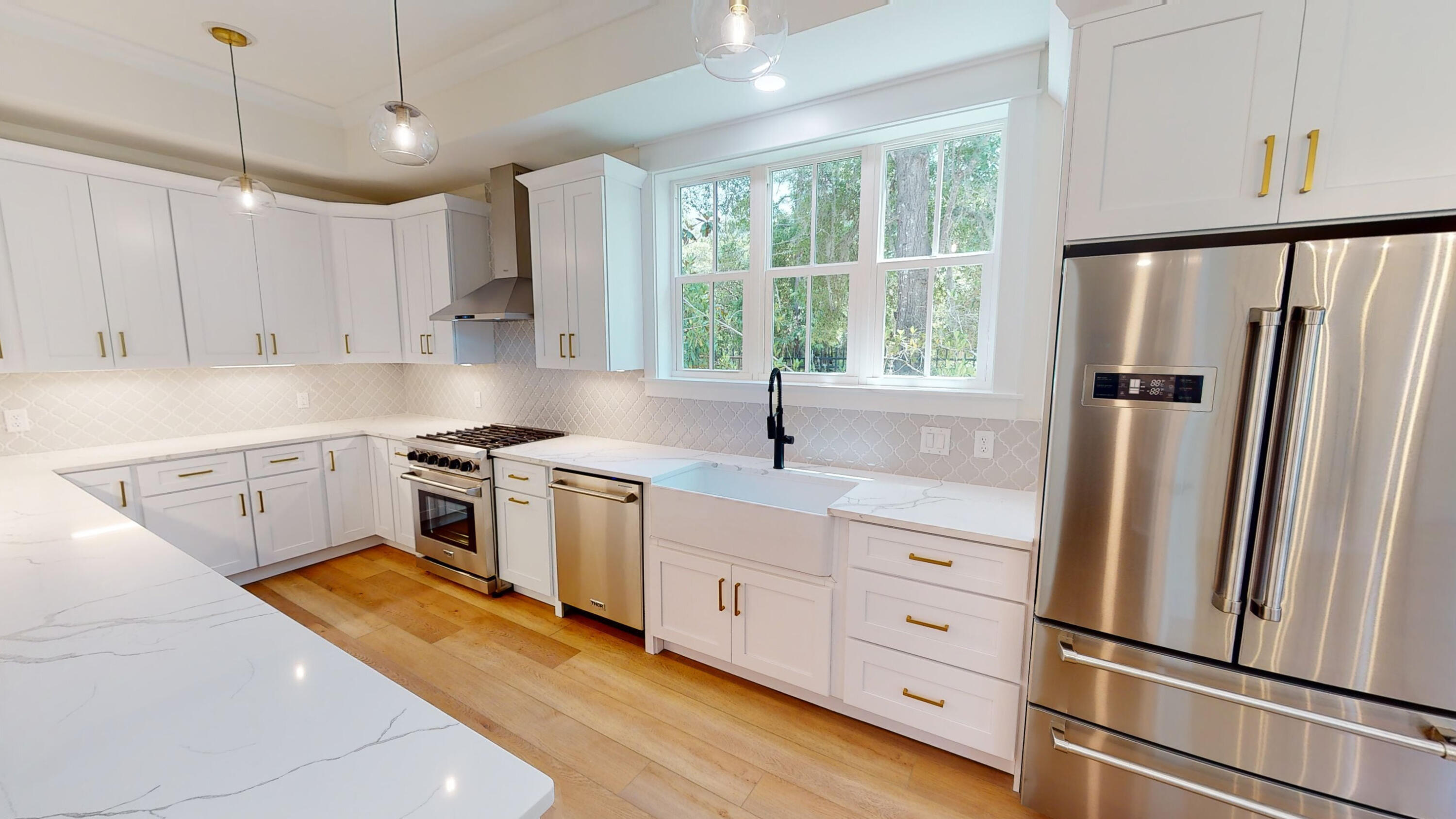 30 Beacon Point Drive Santa Rosa Beach, FL 32459 - Photo 21 of 53 a kitchen with white cabinets and white appliances