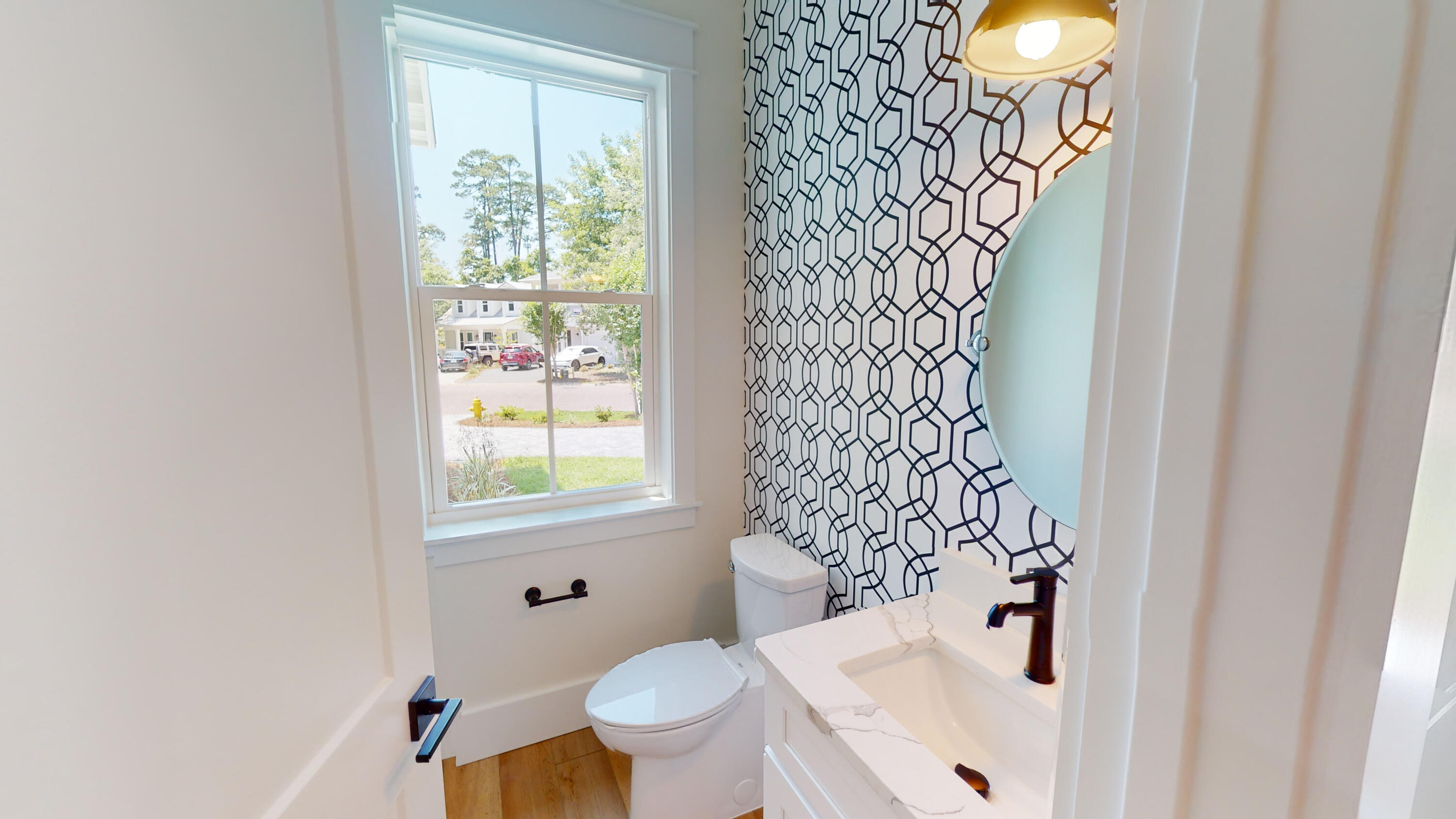 30 Beacon Point Drive Santa Rosa Beach, FL 32459 - Photo 28 of 53 a bathroom with a sink a toilet and a window
