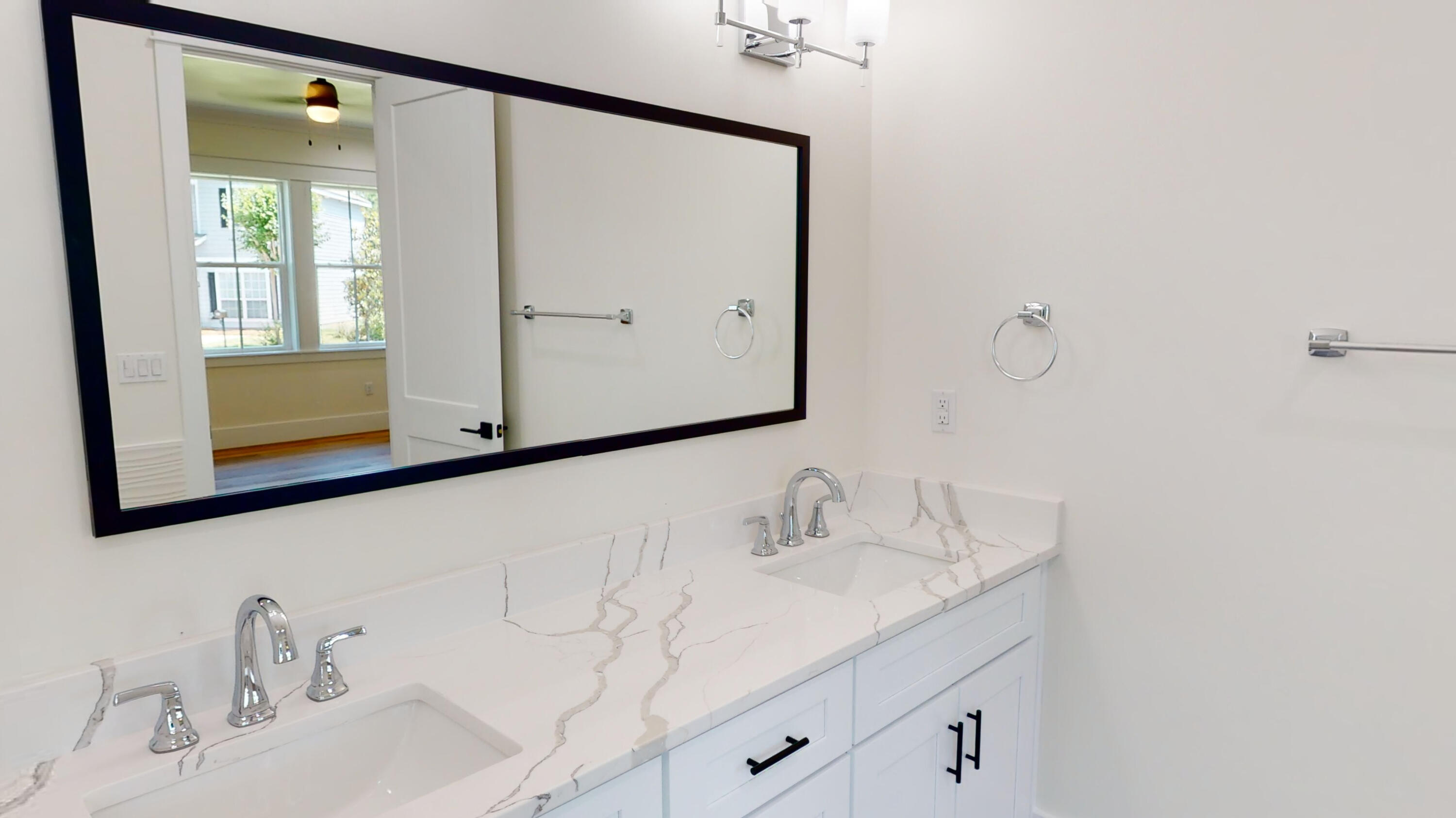 30 Beacon Point Drive Santa Rosa Beach, FL 32459 - Photo 38 of 53 a bathroom with a sink and a mirror
