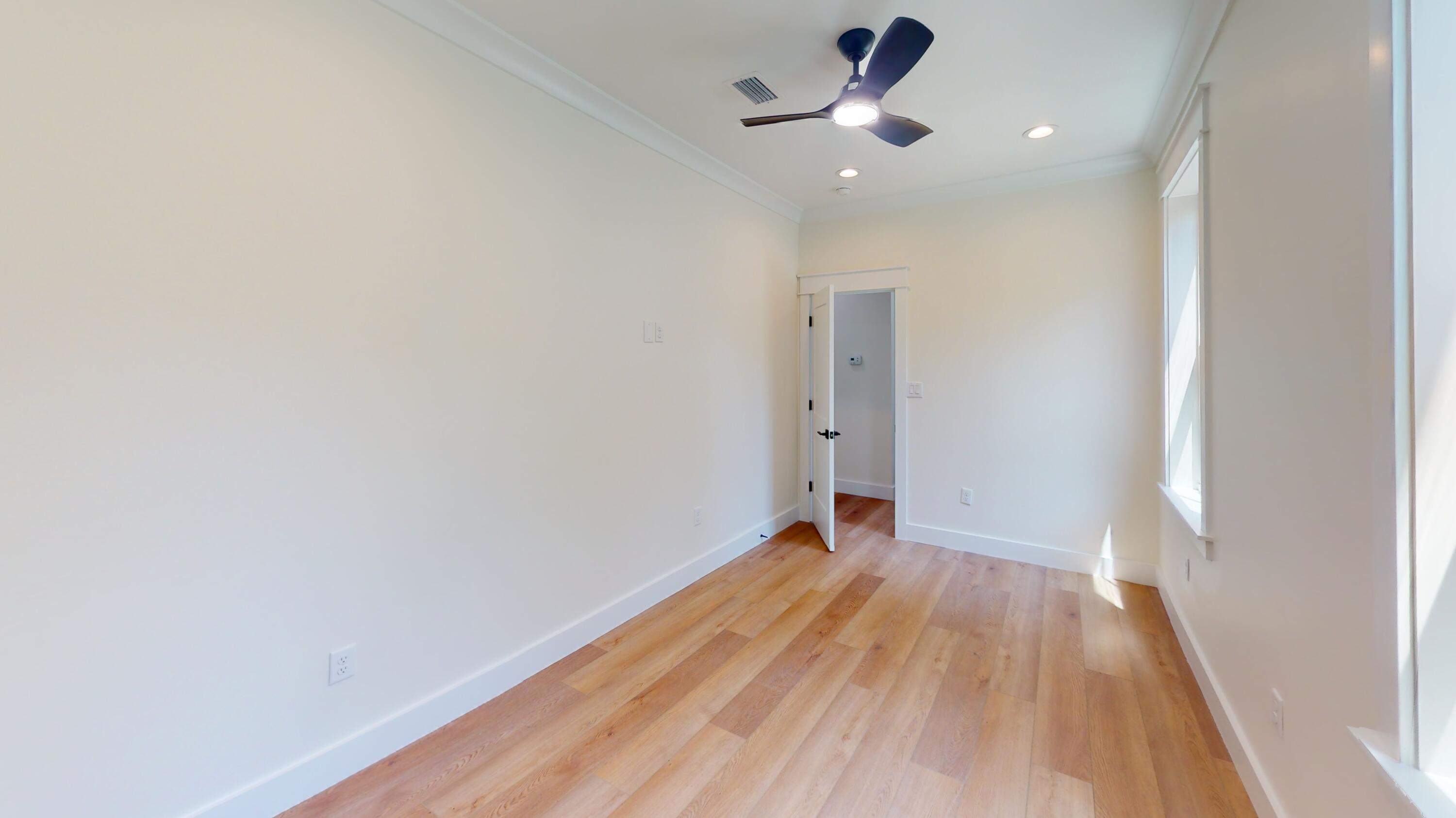 30 Beacon Point Drive Santa Rosa Beach, FL 32459 - Photo 50 of 53 a view of an empty room with wooden floor