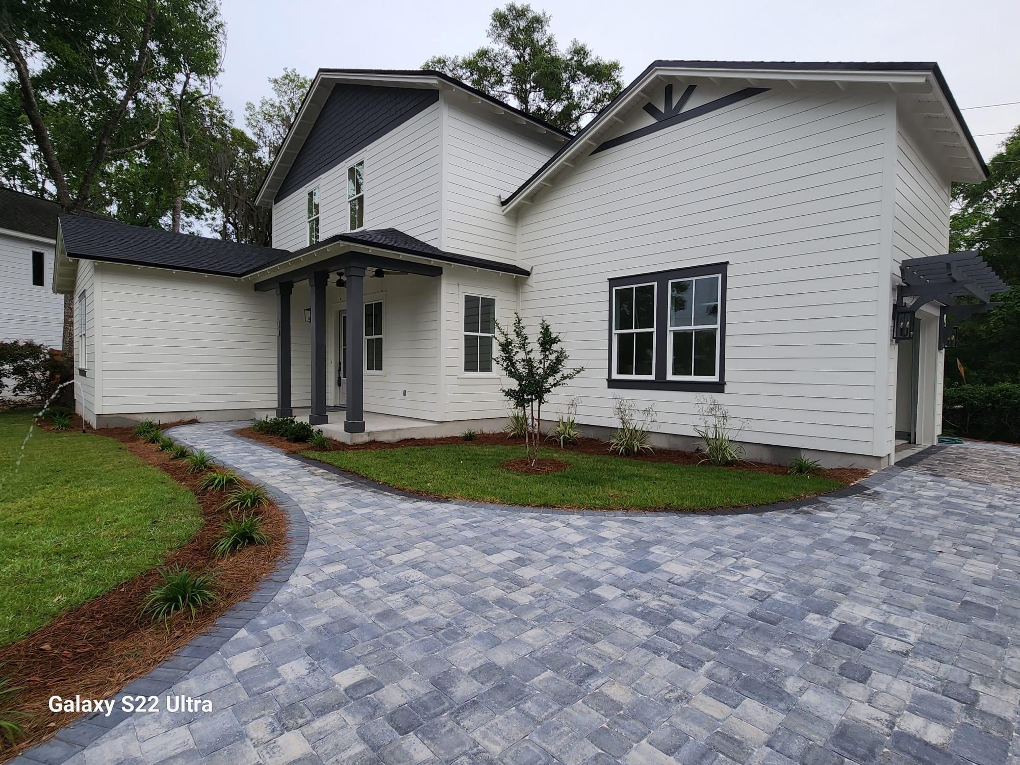 30 Beacon Point Drive Santa Rosa Beach, FL 32459 - Photo 5 of 53 a front view of a house with a yard and garage