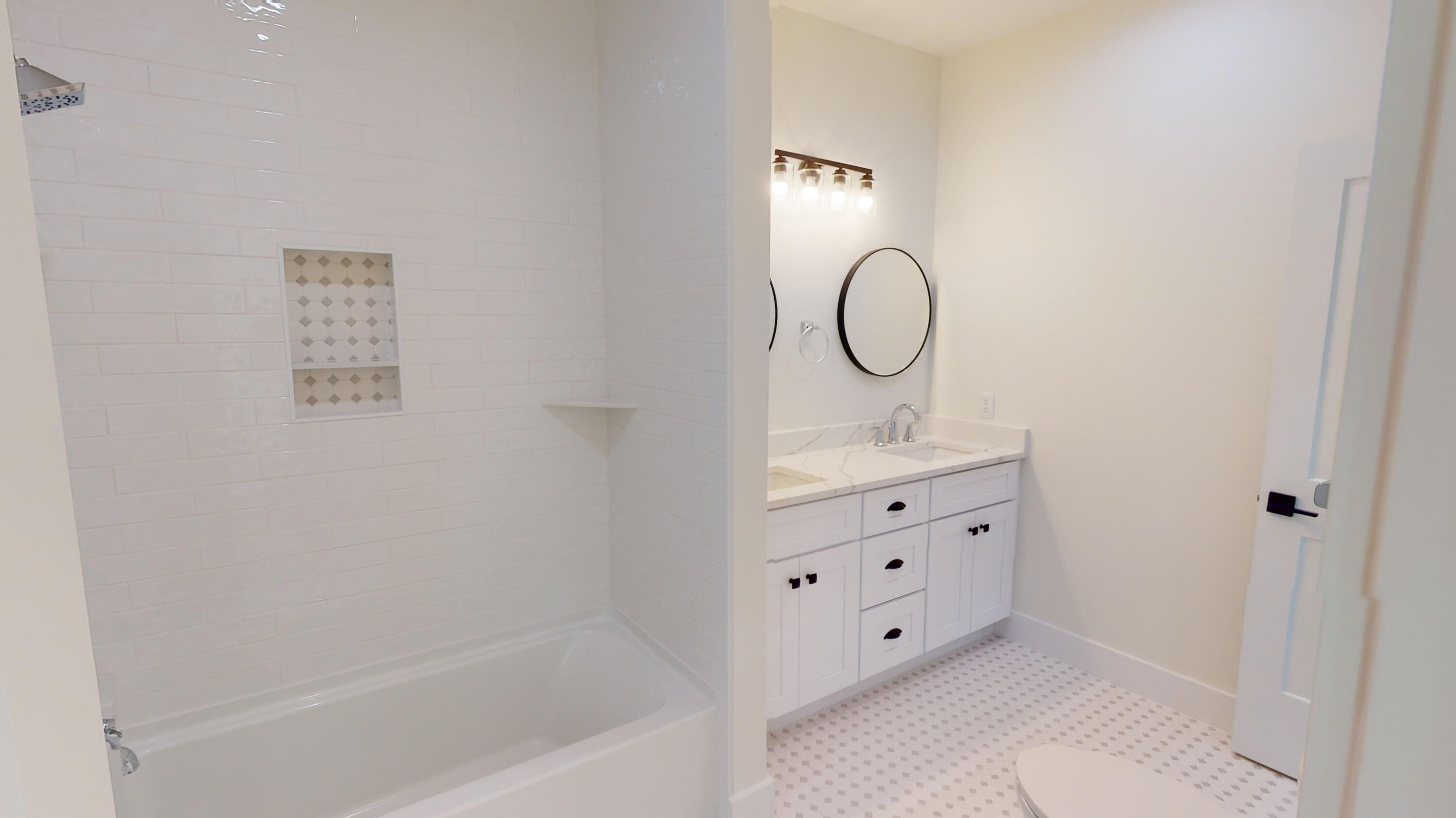 30 Beacon Point Drive Santa Rosa Beach, FL 32459 - Photo 53 of 53 a bathroom with a double vanity sink mirror and a bathtub