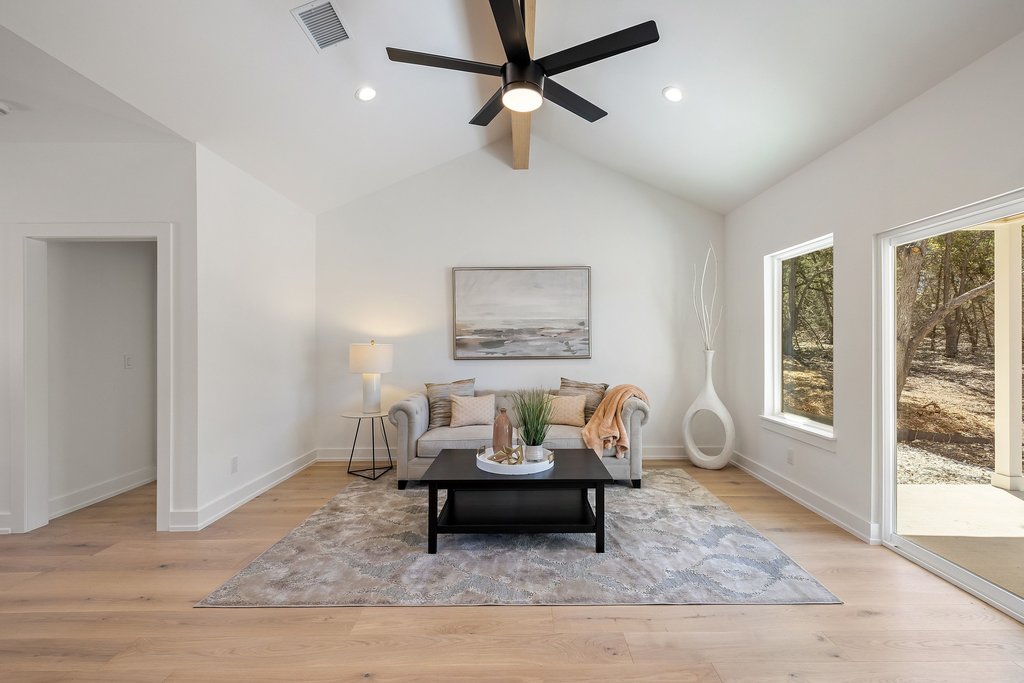 408 Rust Ranch Road Blanco, TX 78606 - Photo 6 of 34 Living area with light wood-type flooring and ceiling fan