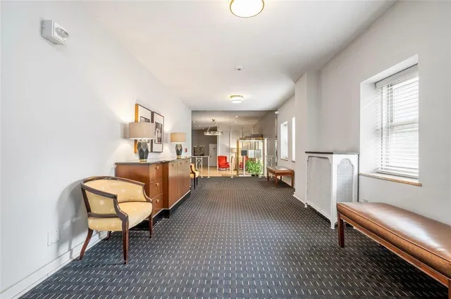 a view of parking garage with cars